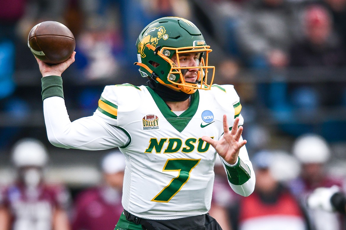 North Dakota State quarterback Cam Miller (7) drops back to pass in the first quarter against Montana in the FCS semifinals at Washington-Grizzly Stadium on Saturday, Dec. 16. (Casey Kreider/Daily Inter Lake)