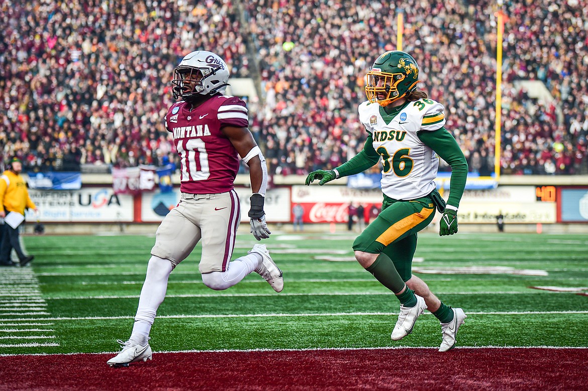 Grizzlies running back Eli Gillman (10) scores a touchdown on a 3-yard run in the second quarter against North Dakota State in the FCS semifinals at Washington-Grizzly Stadium on Saturday, Dec. 16. (Casey Kreider/Daily Inter Lake)