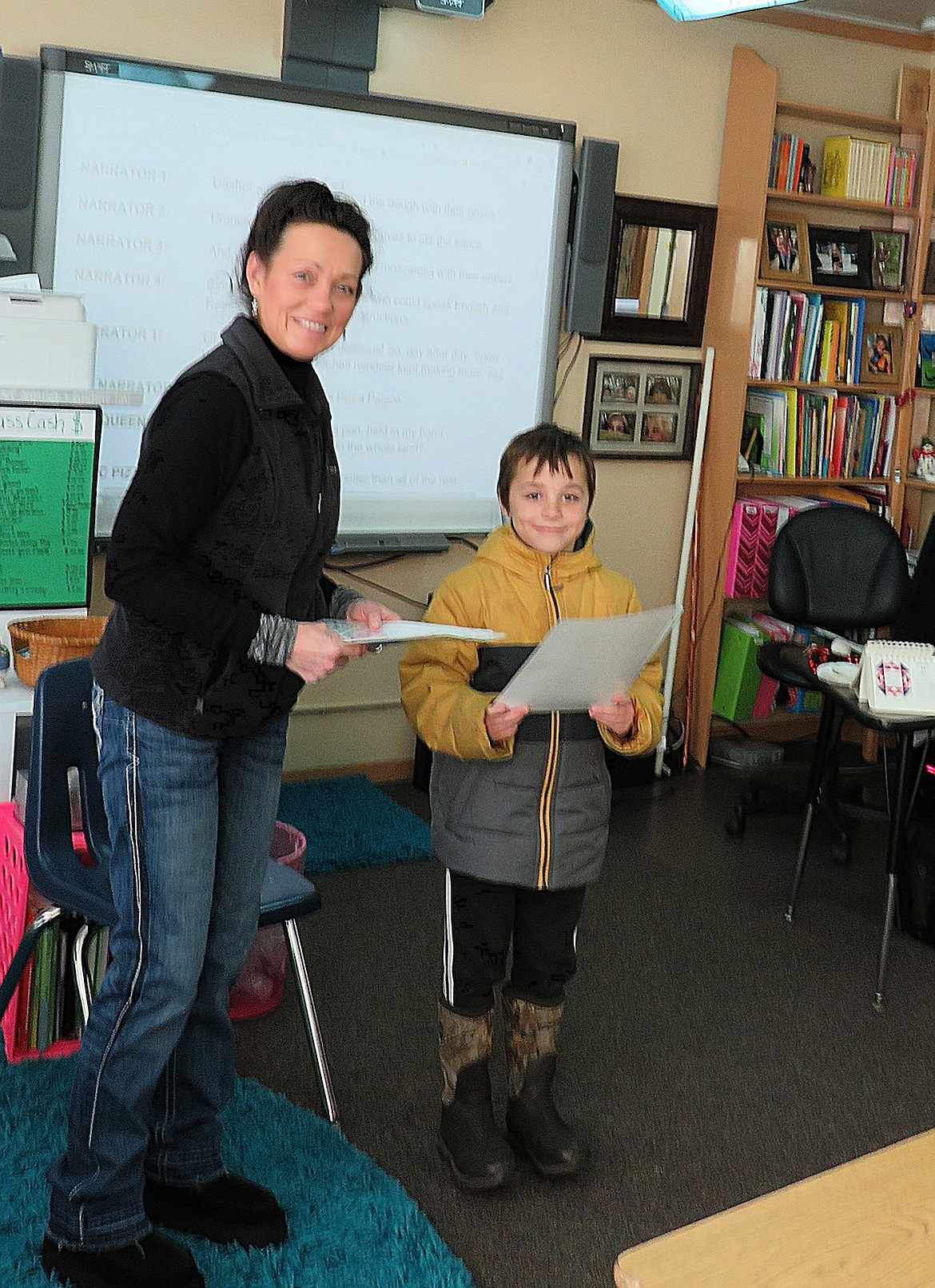 Yaak Wings organizer Roberta Deneau and third grade student Ryker Jewett.