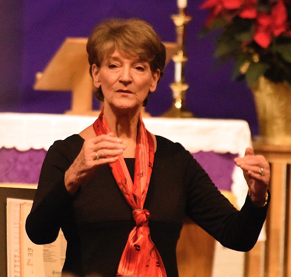 Mission Valley Choral Society Director Cathy Gillhouse talks to the audience during Sunday's performance at the Good Shepherd Lutheran Church. (Berl Tiskus/Leader)