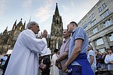 Pope approves blessings for same-sex couples that must not resemble marriage