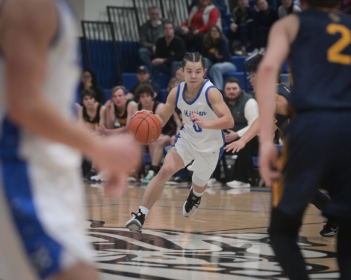 Bulldog Lex LaFrombois runs the ball during Saturday's home game against Deer Lodge. (Christa Umphrey photo)