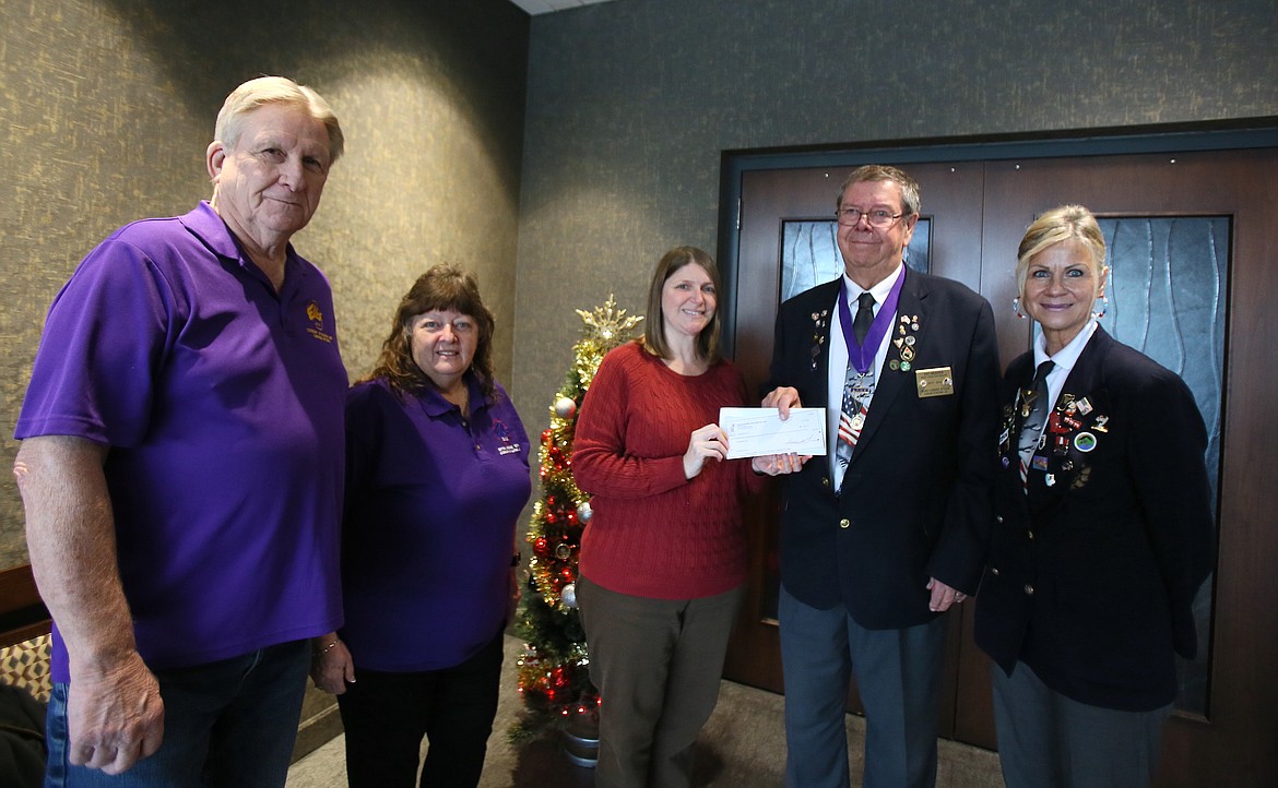 Coeur d'Alene Elks Lodge No. 1254 delivers a check for $5,915.81 to support Press Christmas for All during a presentation Monday at the Coeur d'Alene Press office. From left: Elks Trustee Bill Johnson and Elks Fundraising Promotion Director Rene Johnson; Dawn DuPree-Scott, Press business office; Past Elks Exalted Ruler Pat Braden and Exalted Ruler Molley Earr.
