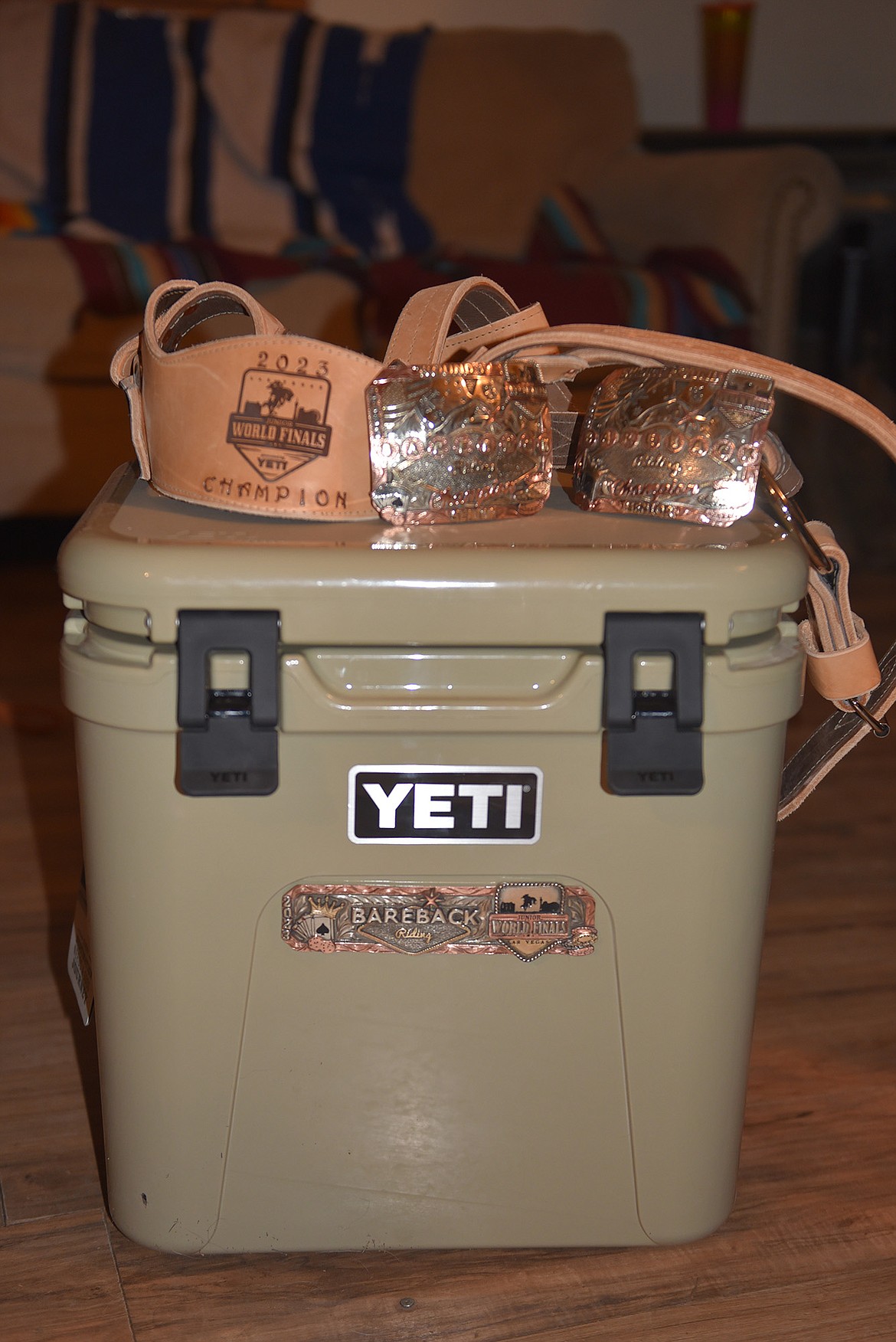 Some of Lara's winnings from the Yeti Junior World Finals include a bronc halter, silver buckles and a YETI cooler. (Julie Engler/Whitefish Pilot)