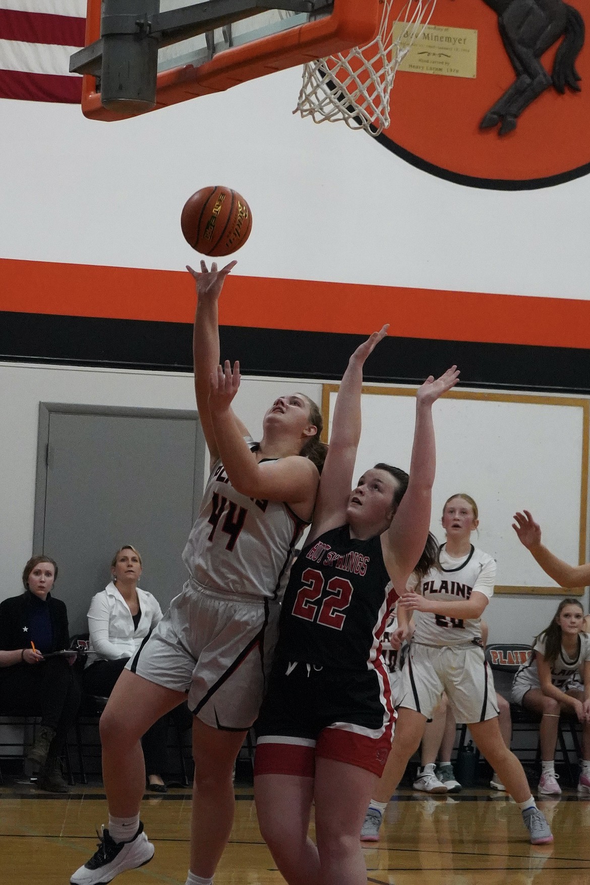 Trotters junior post Lexi Deming (44) puts up a layup over Hot Springs's forward Brooke Jackson during their game last Tuesday in Plains.  (Courtesy photo)