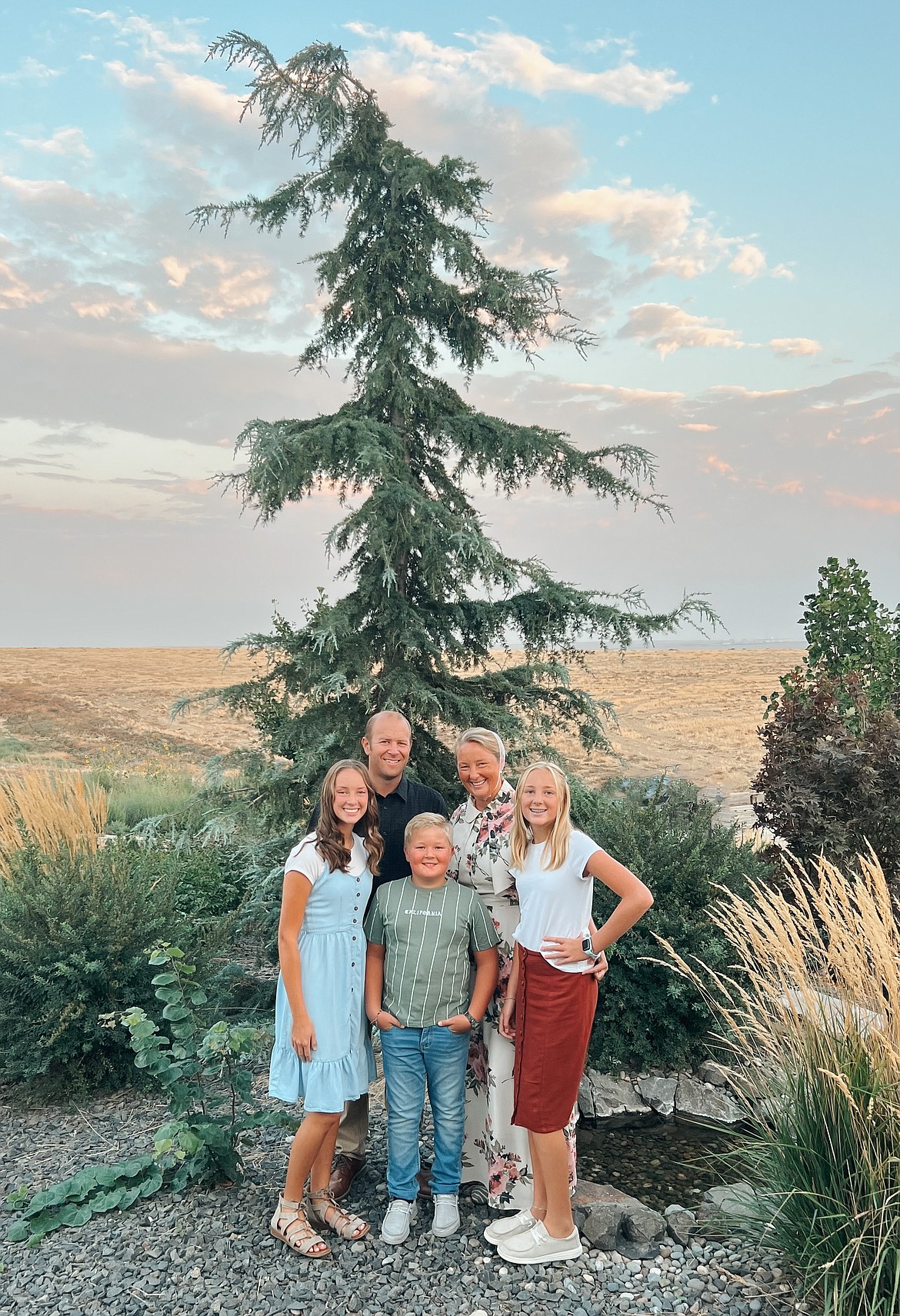 Titus and Rachel Bowser with their children. The Bowsers work together with the children pitching and Rachel serving as the secretary for the company while Titus serves as president of the company. The Bowsers say they enjoy the lifestyle offered in the Othello area.