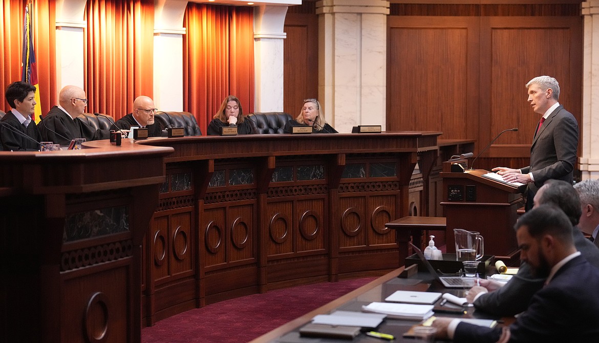 Attorney Eric Olson, far right, argues before the Colorado Supreme Court on Wednesday, Dec. 6, 2023, in Denver. The Colorado Supreme Court on Tuesday, Dec. 19, declared Trump ineligible for the White House under the U.S. Constitution’s insurrection clause and removed him from the state’s presidential primary ballot, setting up a likely showdown in the nation’s highest court to decide whether the front-runner for the GOP nomination can remain in the race. (AP Photo/David Zalubowski, Pool)