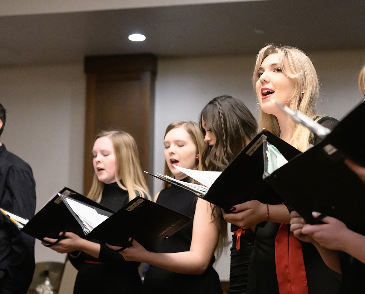 From left, Sonifers Isabella Fitch, Amanda Fitch, Erica Burguiere, Angela Allen sing during the Jazz Cafe concert Friday. (Chris Peterson photo)