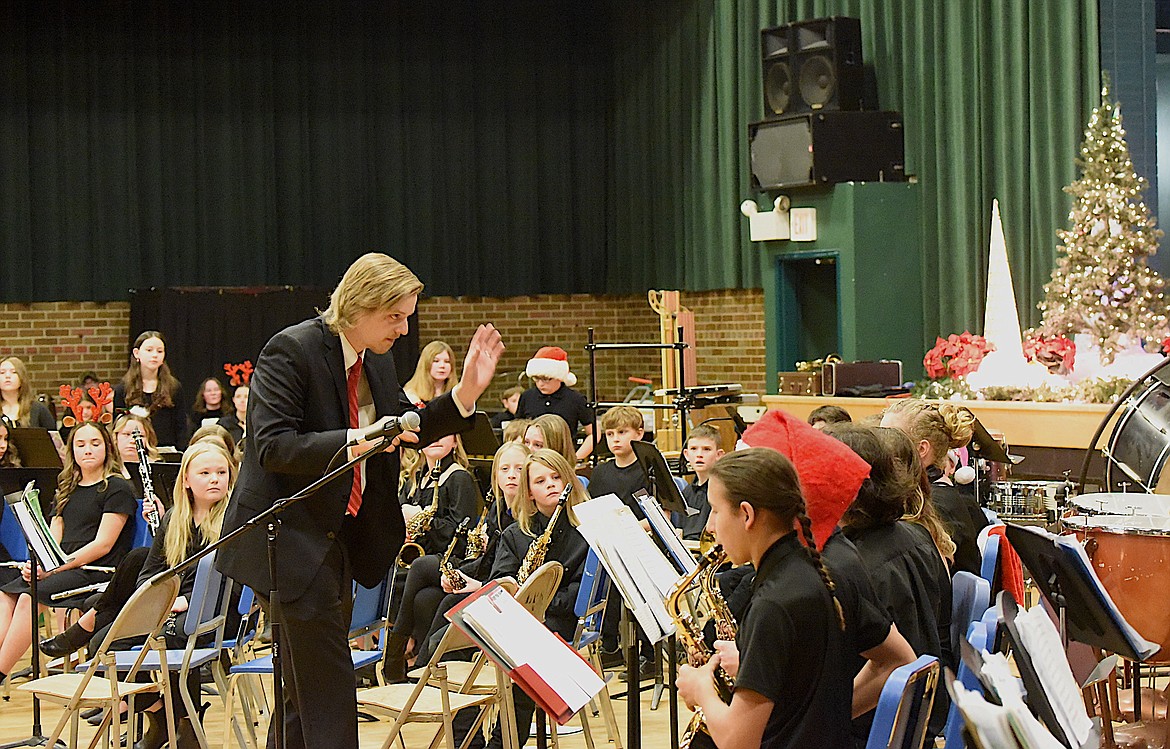 Libby Public School Band Director Brandon Boone led middle and elementary school students in performances of Christmas music and songs of the season Tuesday evening at the Memorial Center. (Scott Shindledecker/The Western News)