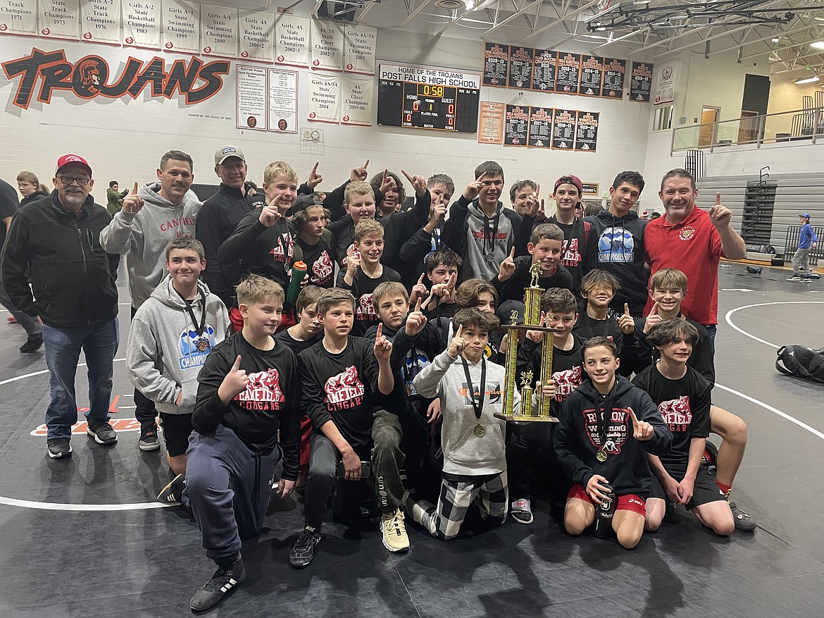 Courtesy photo
The Canfield Middle School wrestling team recently won the North district title for the third year in a row. In the front row from left are Colby Cox, Owen Newby, Nash Larson, Dylan Coulson, Kade Robbins, Micah Miller and Evan Matheson; second row from left, Aaron Garvin, Landon Crouch, Bryson Wallace, Drake Speelman, Cole Armstrong, Carson Vig, Austin Schield and Logan Nitti; and back row from left, coach Jim Whiteman, coach Tony Hook, coach Matt King, Pete Seversen, Chance Tucker, Brecken Willoughby, Quinten Beck, Mason Hector, Reed Robbins, Josiah Boyman, Garrett Cleveland, Liam Carder and coach Matt Armstrong.