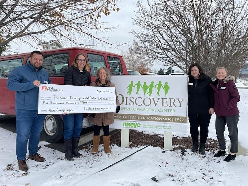 In November 2022 First Interstate Bank's Ambassador Program helped kick off Discovery Developmental Center’s van campaign with a $5,000 donation. The check was presented to DDC Director Collette Box, pictured here with Stephen Walters and Jessica Tabish, both from the Whitefish branch, Elizabeth Clairmont from the Polson branch, and Emily Palus from the Evergreen branch.