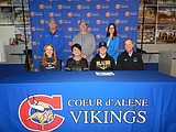 Signing photos Dec. 27, 2023