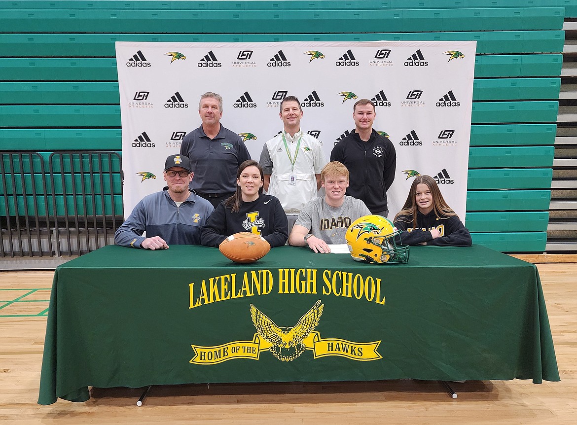 Courtesy photo
Lakeland senior Owen Forsman signed his letter of intent to play football at Idaho on Wednesday. In the back row, from left are Lakeland head football coach Mike Schroeder, Lakeland athletic director Matt Neff and kicking coach Seth Harrison. In the front are Travis Forsman (father), Katie Forsman (mother), Owen Forsman and Addi Forsman (sister).