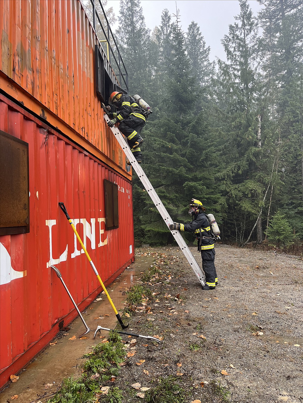 Firefighter academy students take part in a training exercise.