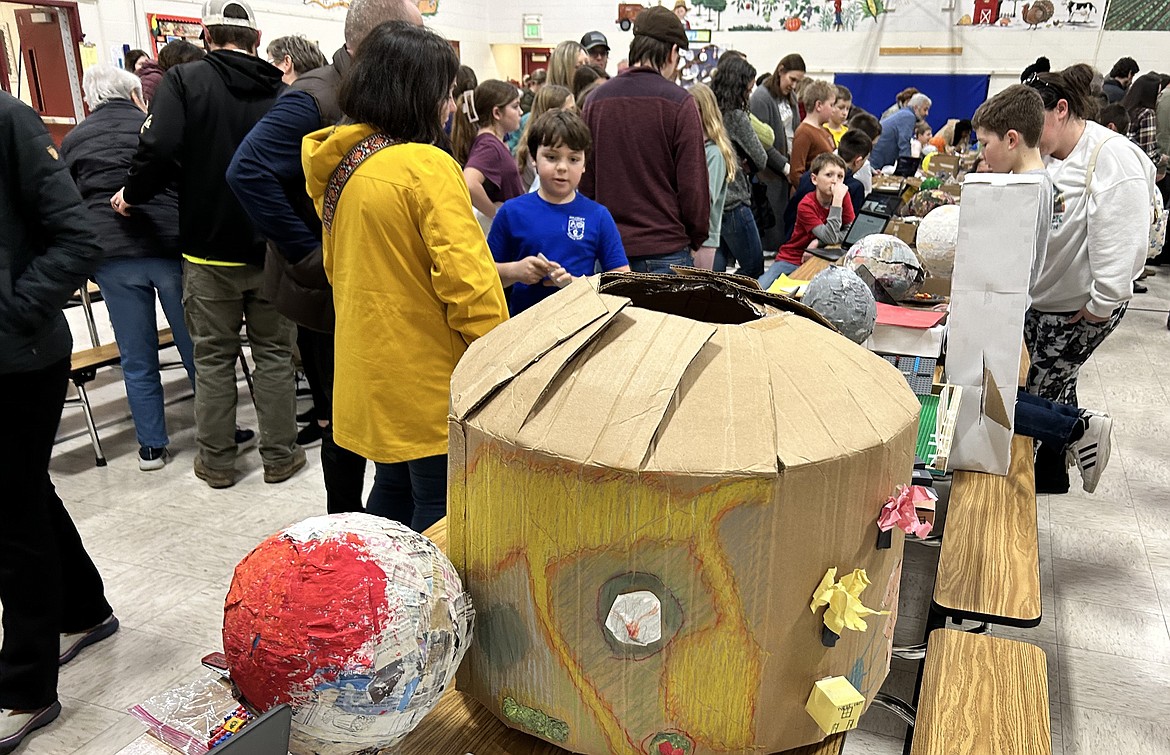 Ian Frengle explains his planetary project during an open presentation of their solar system projects to their school and families. Frengle attends Scott Busch's fifth grade class.