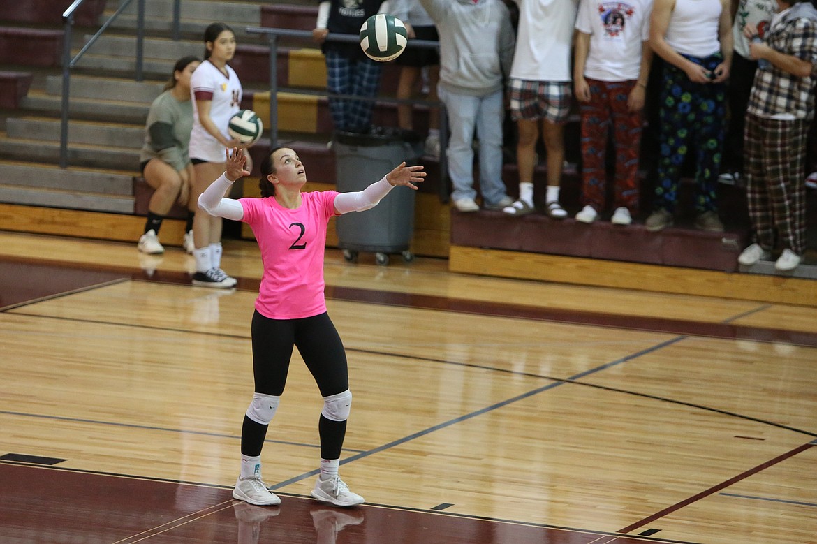 Moses Lake senior Raegen Hofheins (2) serves the ball during a game in the 2023 volleyball season.