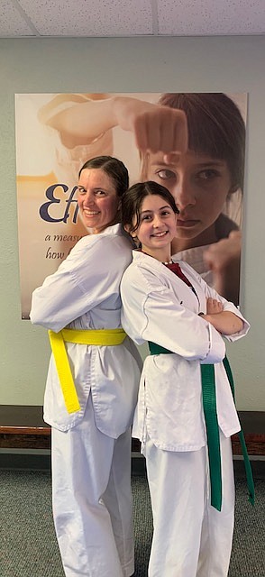 Adult/Teen class. Left to right, Birgitta Hughes (Yellow Belt) and Elena de Basilio (Green Belt)