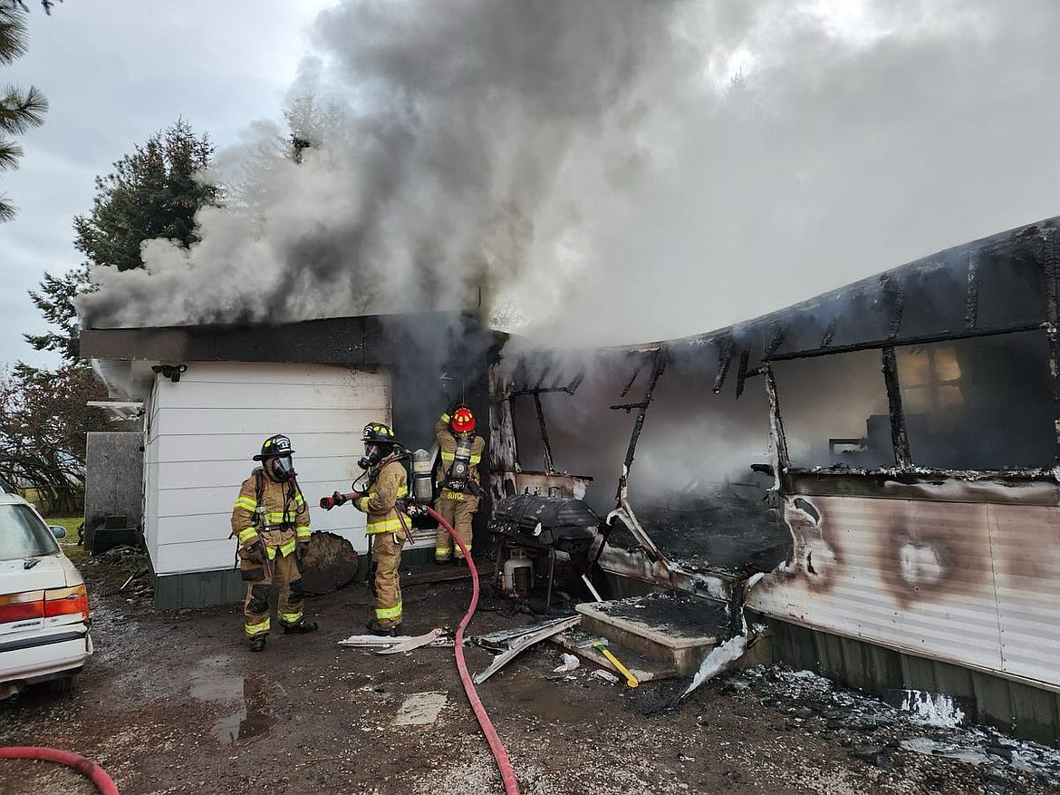 Firefighters respond to a structure fire off Whitefish Stage Road in Evergreen on Wednesday, Dec. 20. (Evergreen Fire Rescue photo)