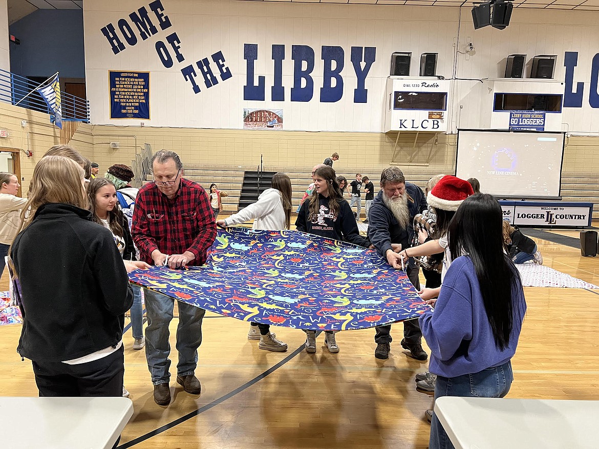 Among the many 'Gratitude Day' activities at Libby Middle High School on Thursday, Dec. 21, teachers and students made quilts to give to residents of the Libby Care Center. (Photo courtesy Mandi Foss, Libby High School)