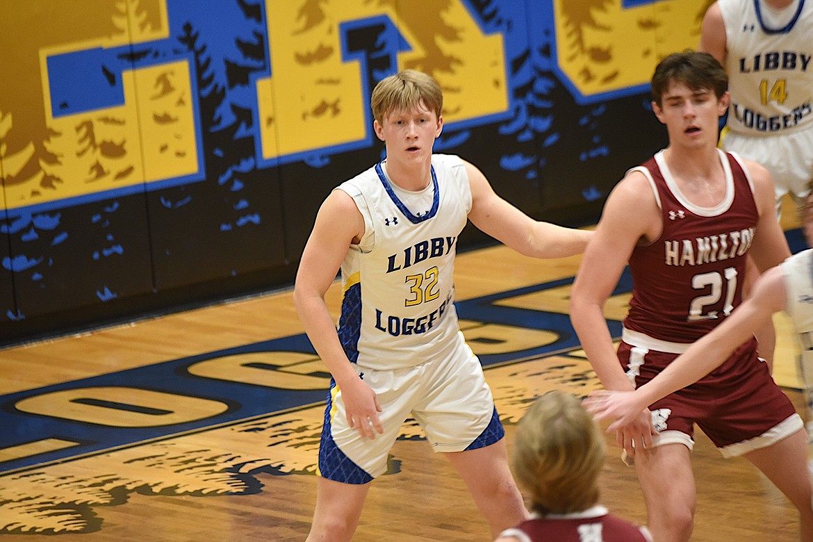 Libby's Cy Williams plays defense against Hamilton on Thursday, Dec. 21, 2023. (Scott Shindledecker/The Western News)