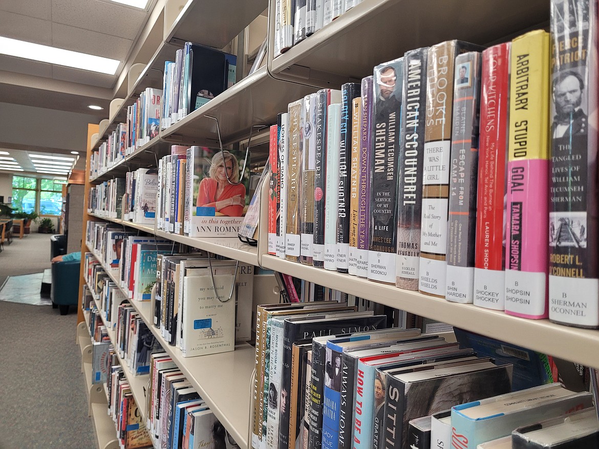 Library books are seen on shelves of a Community Library Network earlier this year.