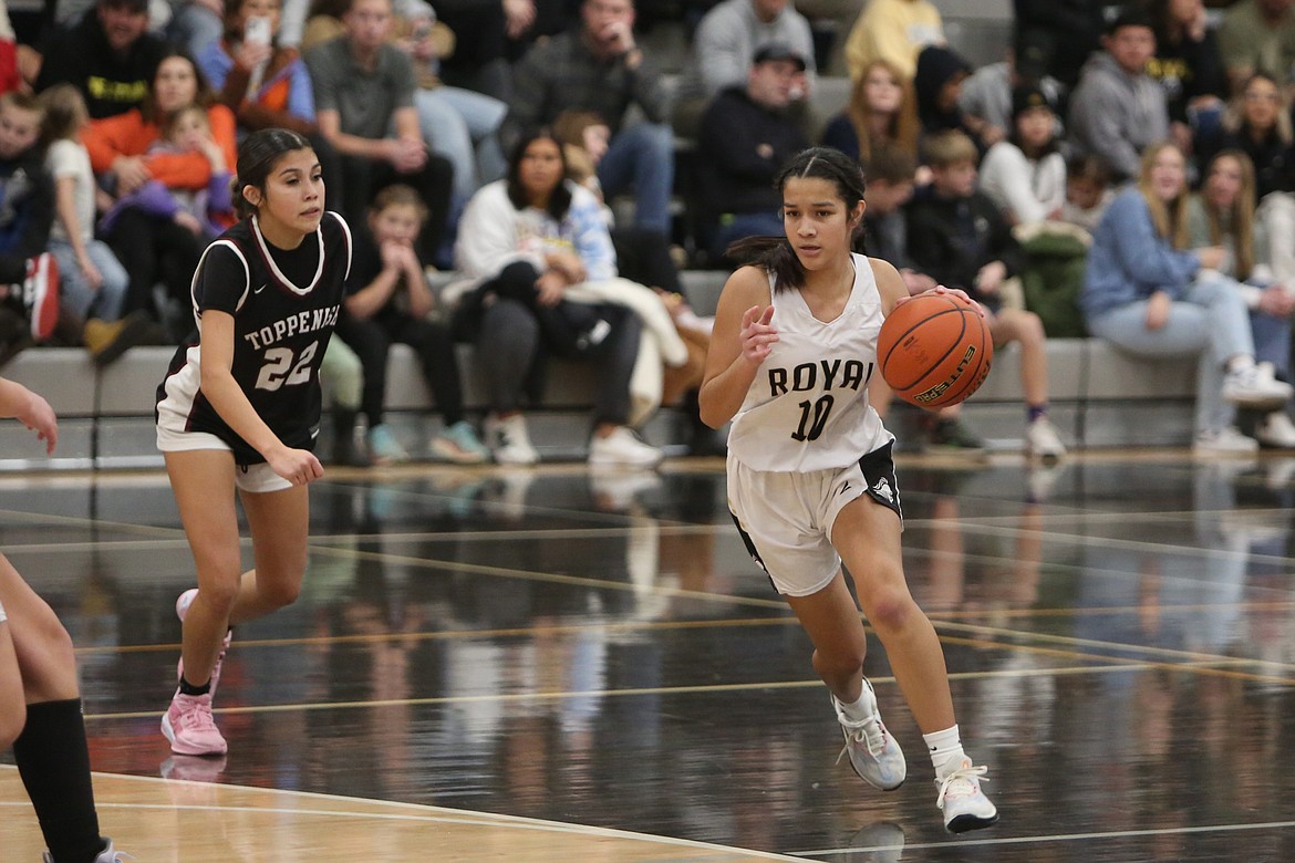 Royal freshman Vanesa Cedillo looks for an open lane in the fourth quarter against Toppenish.