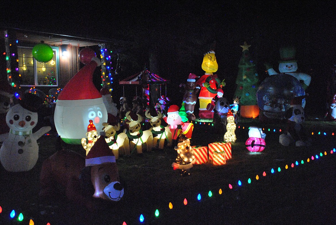 Up in Cougar Meadows, third place went to Natalie Davis, who was grateful for green grass this year. "Last year with all the snow, my inflatable decorations were really hard to see and got all smushed beneath the weight," she laughed. Some of her favorite holiday decor are hand me downs from her Mom, of a real moving Christmas themed ferris wheel and carousel. Davis encouraged families with children to come and stop by to see for themselves. (Mineral Independent/Amy Quinlivan)