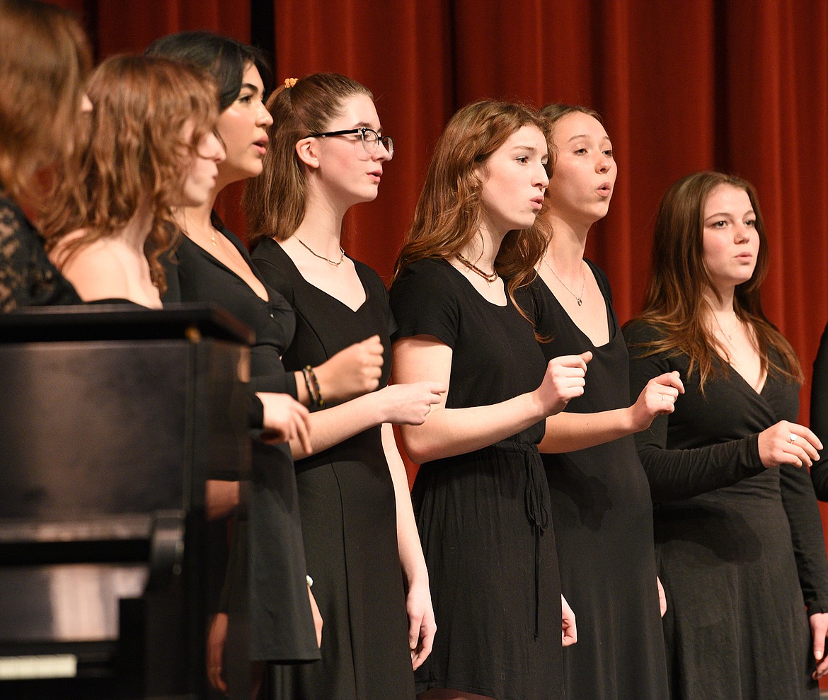 The Whitefish High School Treble Choir performs during the choir program's mid-December winter concert. (Whitney England/Whitefish Pilot)
