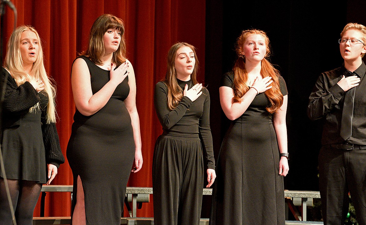 The Whitefish High School Treble Choir performs during the choir program's mid-December winter concert. (Whitney England/Whitefish Pilot)