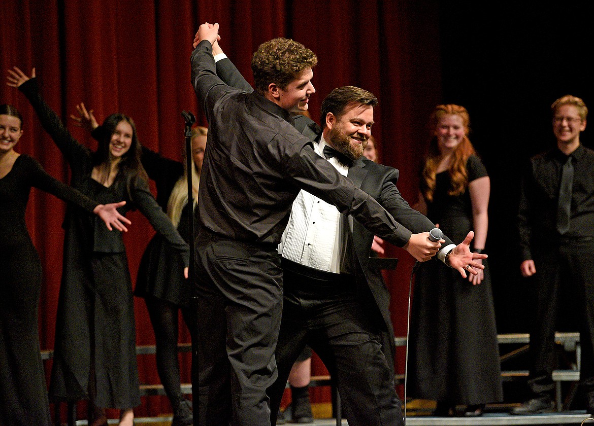 Cole Pickert and Choir Director Sky Thoreson end a fun rendition of "Jingle Bells" during the choir program's mid-December winter concert. (Whitney England/Whitefish Pilot)