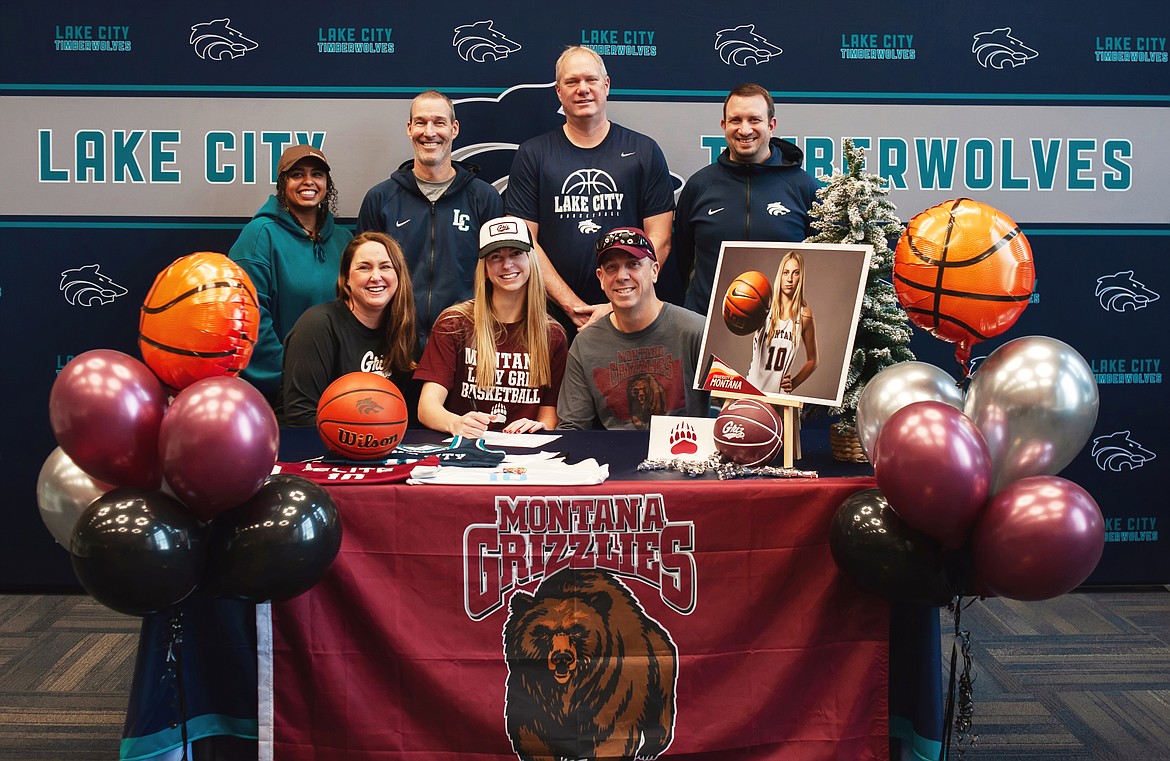 Courtesy photo

Lake City High senior Avery Waddington recently signed a letter of intent to play basketball at the University of Montana. Seated from left are Amy Waddington (mom), Avery Waddington and Mark Waddington (dad); and standing from left, Whitney Teu Teu, Lake City High assistant girls basketball coach; David Pratt, Lake City High head girls basketball coach; Dan Smith, Lake City High assistant girls basketball coach; and Troy Anderson, Lake City High athletic director. Not pictured are James Anderson, former Lake City High girls basketball coach; and Tom Gasper, former Lake City High girls basketball assistant coach.