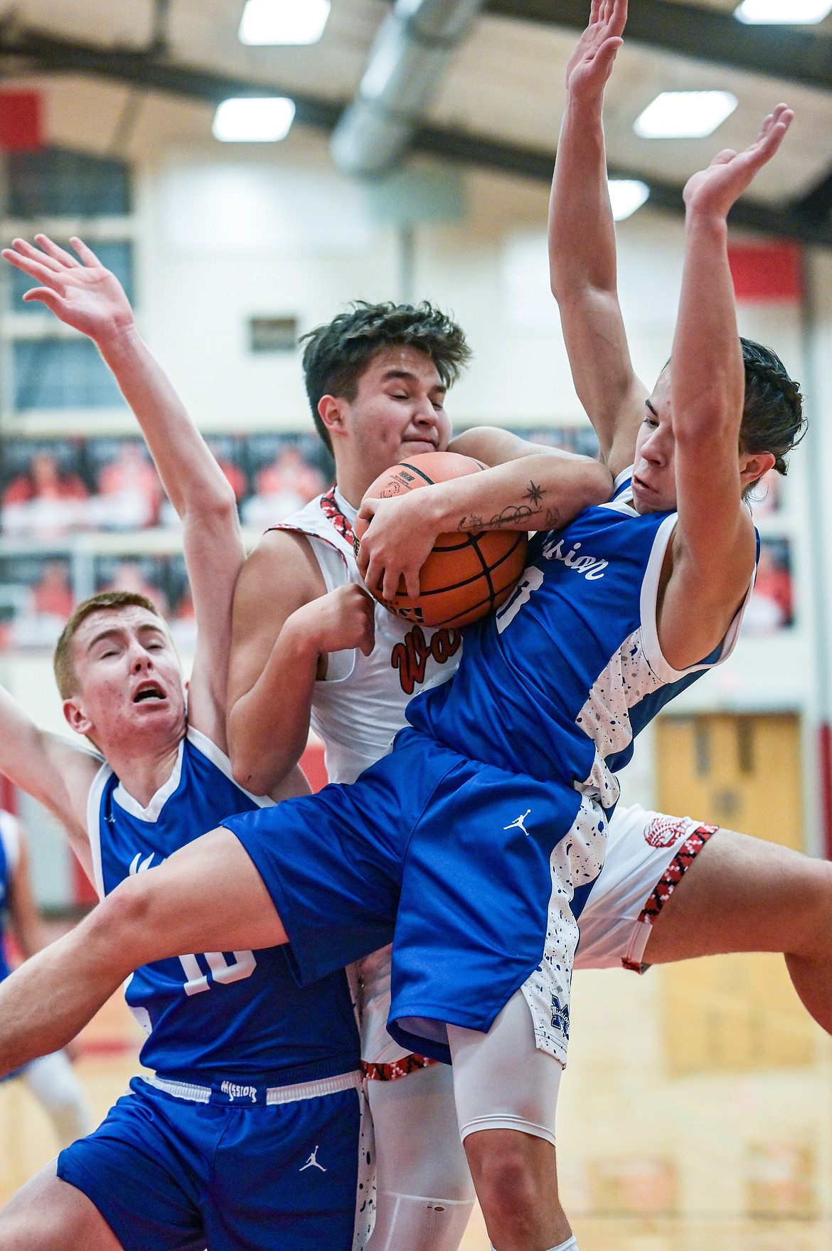 Arlee Warrior keeps a grip on the ball during recent contest against Mission. Arlee has started the season 5-0 and is the highest scoring team in the Western 6B. (Christa Umphrey photo)