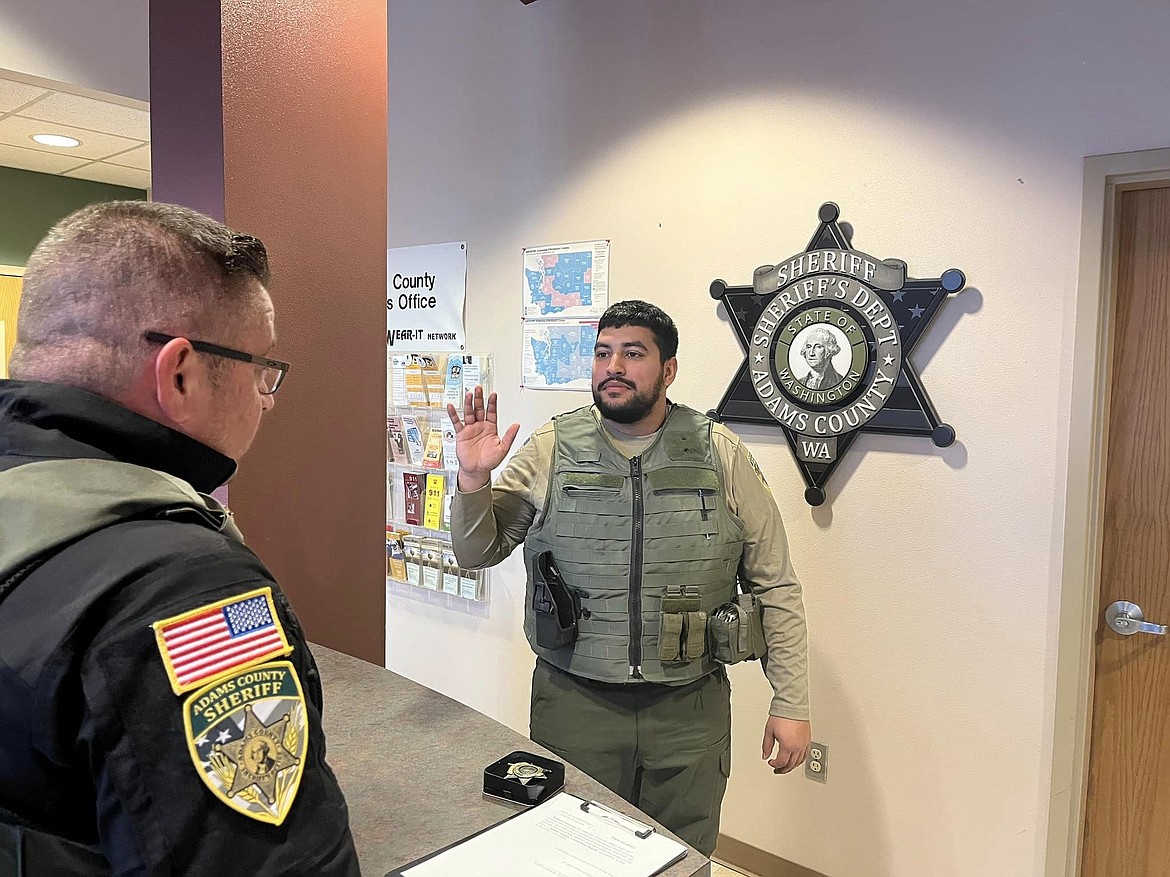 Adams County Sheriff’s Office corrections officer Gustavo Vasquez is sworn in the morning of December 6. Vazquez was hired as part of ACSO’s ongoing efforts to reopen the Adams County Jail.