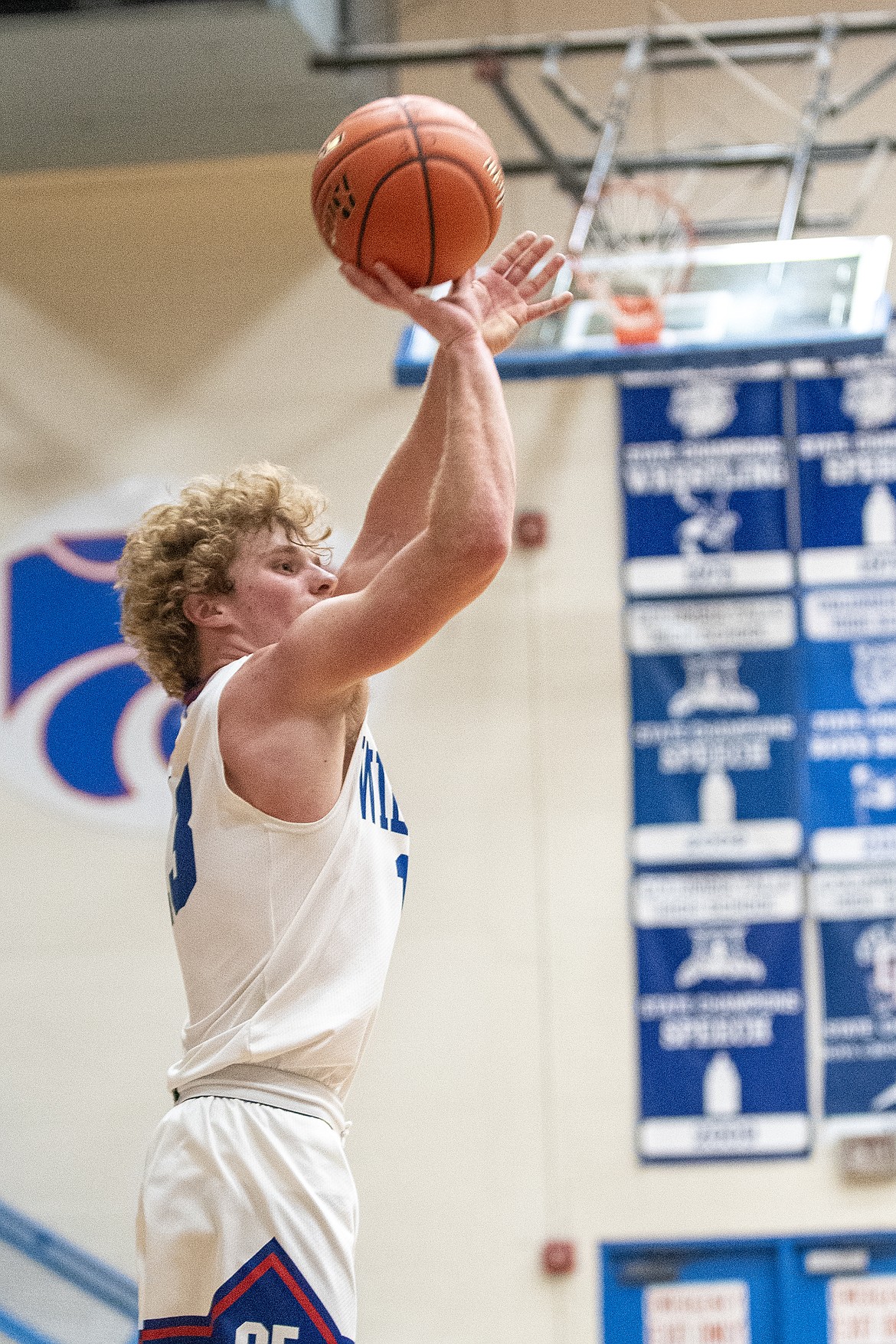 Wildcat Alihn Anderson tries for three against Frenchtown at home on Tuesday, Dec. 19. (Avery Howe photo)