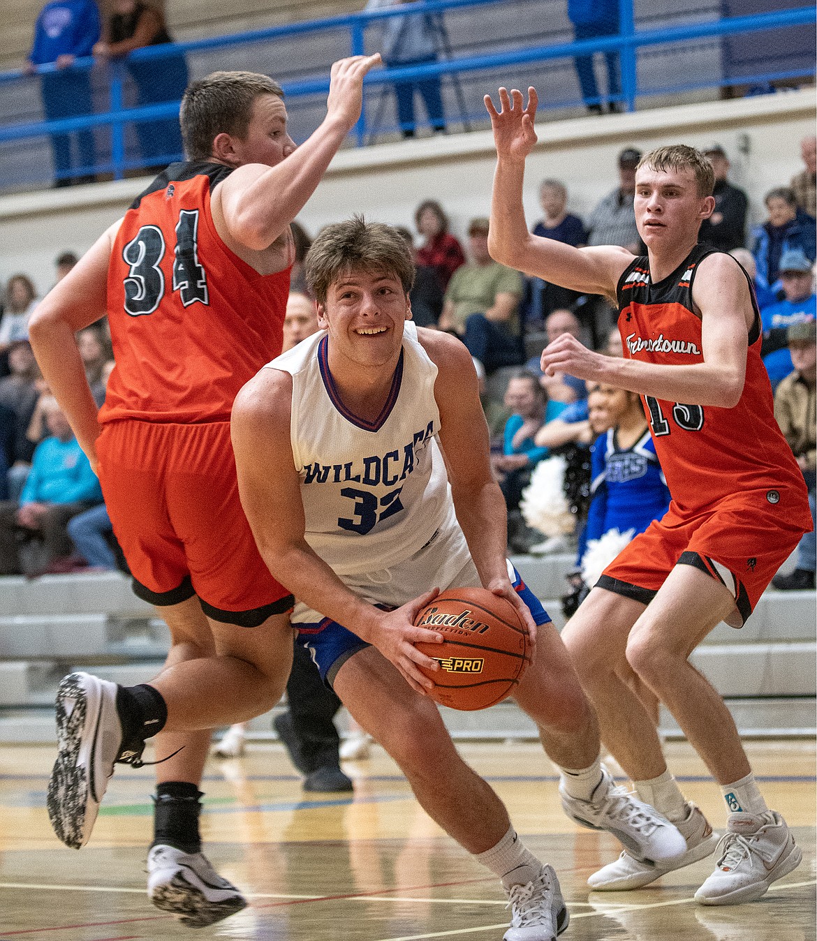 Cody Schweikert pushes through Frenchtown’s defense under the basket on Tuesday, Dec. 19. (Avery Howe photo)