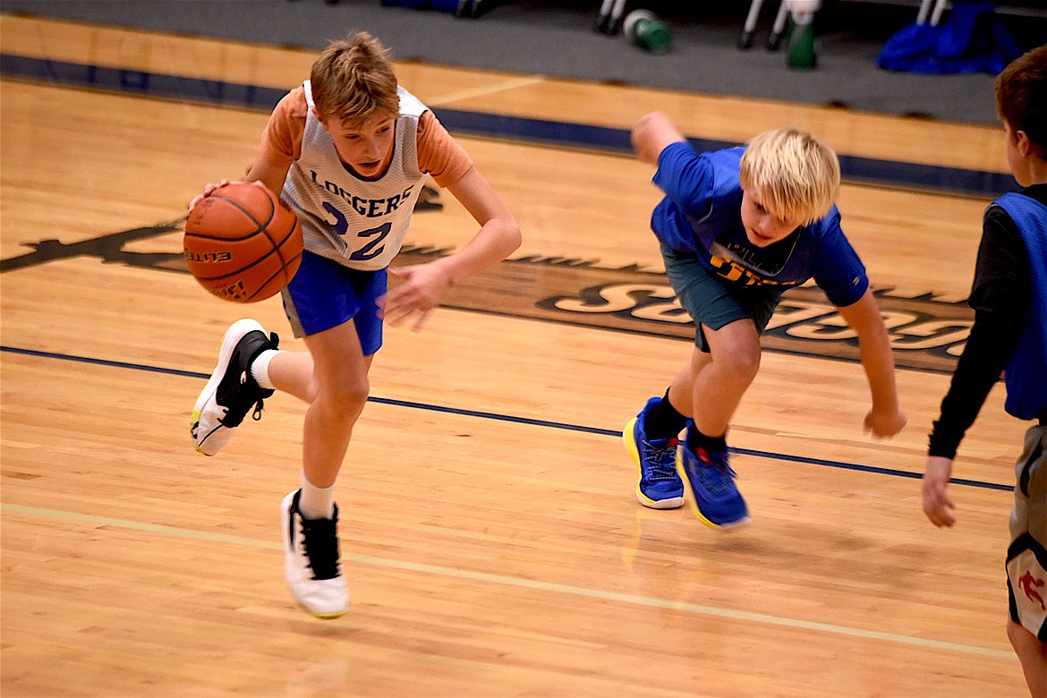Members of the Libby Elementary School basketball teams played each other at halftime of the Dec. 22 games. (Scott Shindledecker/The Western News)