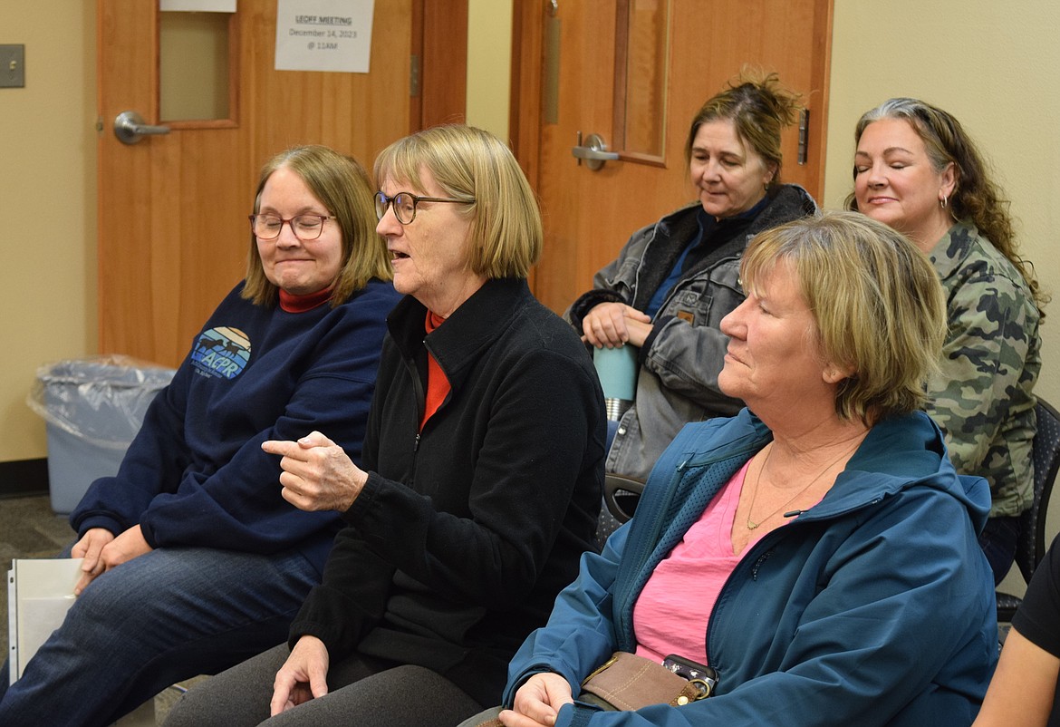 Adams County Pet Rescue board member Tammy Foley, left, and Othello resident Kim Bailey, middle, attend an Adams County Commissioner’s meeting to advocate for additional funding for ACPR. Foley and Bailey continue to hold classes on animal care in schools in Othello.