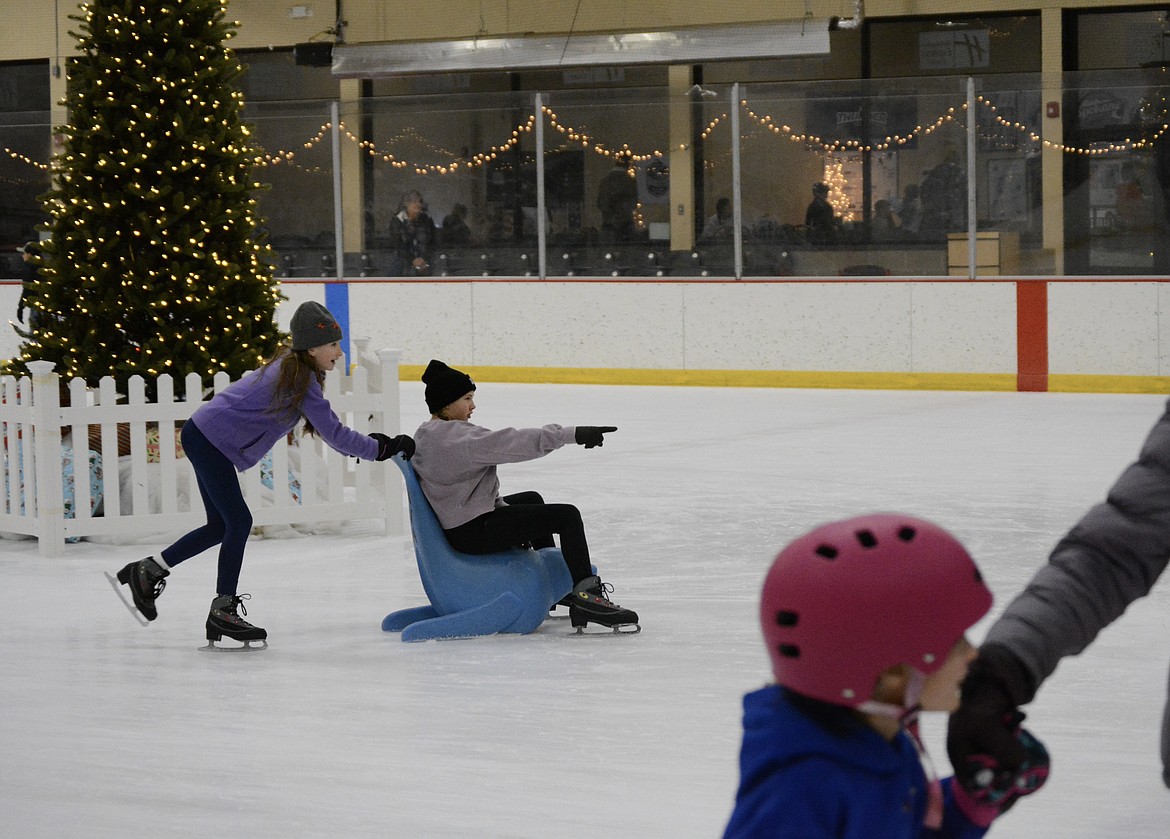 Kyah Webb celebrated her birthday on the ice Wednesday afternoon and was pushed around on a plastic seal by Abby O’Malley.