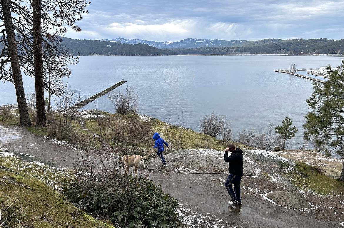 Visitors to Tubbs Hill enjoy a view of Lake Coeur d'Alene on Wednesday.