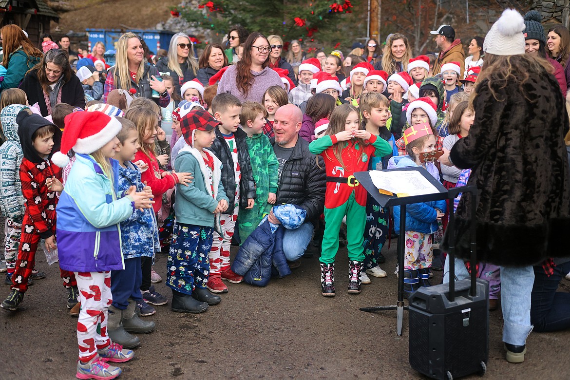 Bigfork Elementary students and teachers sing Christmas Carols at the downtown Christmas Tree Dec. 21, 2023. (Jeremy Weber/Bigfork Eagle)