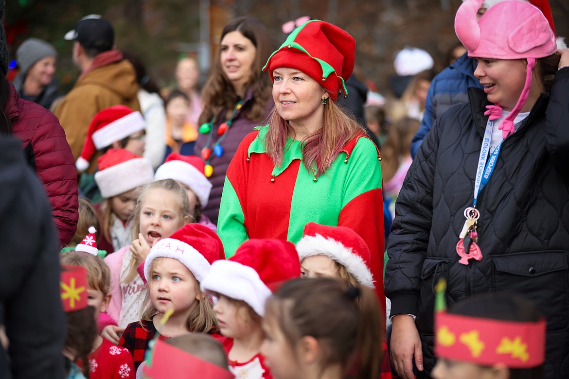 Bigfork Elementary students and teachers sing Christmas Carols at the downtown Christmas Tree Dec. 21, 2023. (Jeremy Weber/Bigfork Eagle)