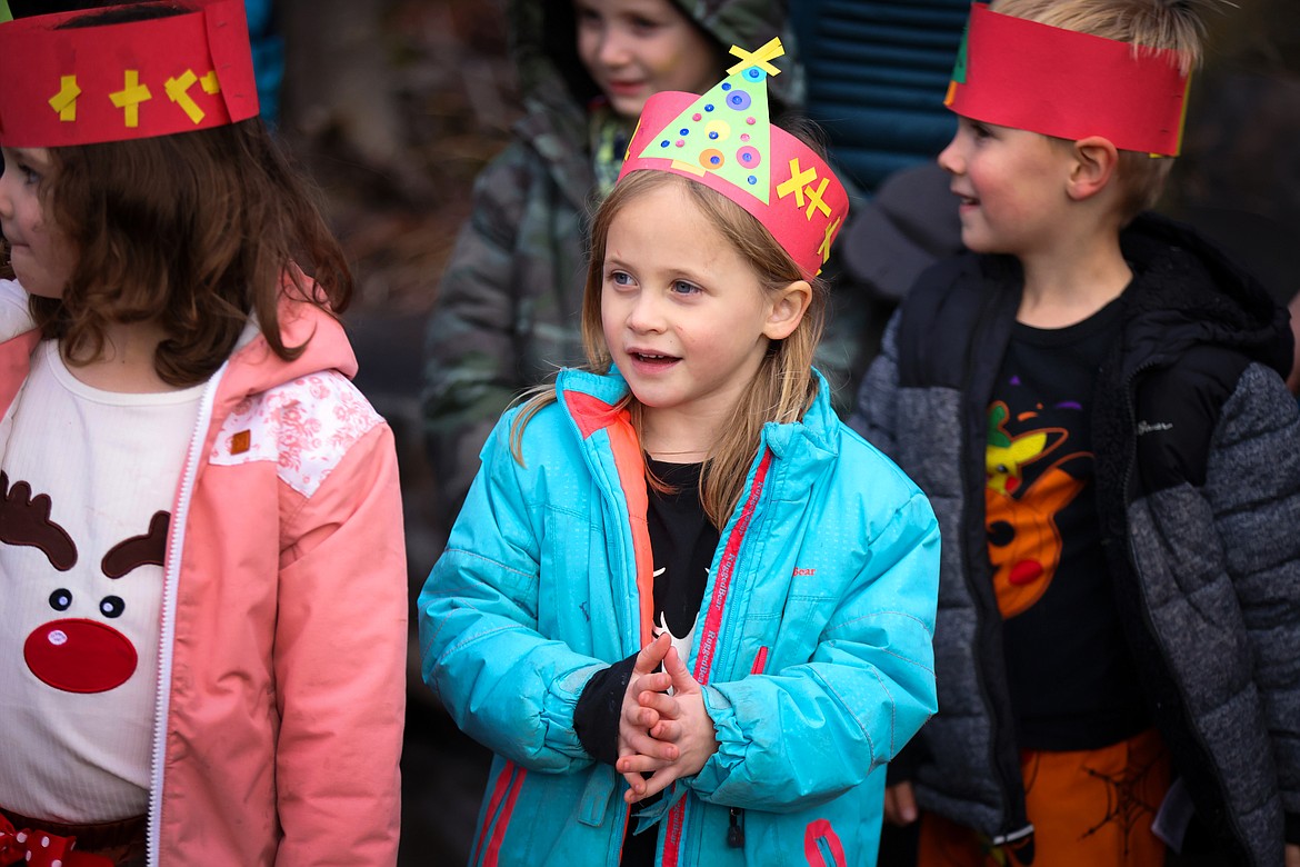 Bigfork Elementary students and teachers sing Christmas Carols at the downtown Christmas Tree Dec. 21, 2023. (Jeremy Weber/Bigfork Eagle)