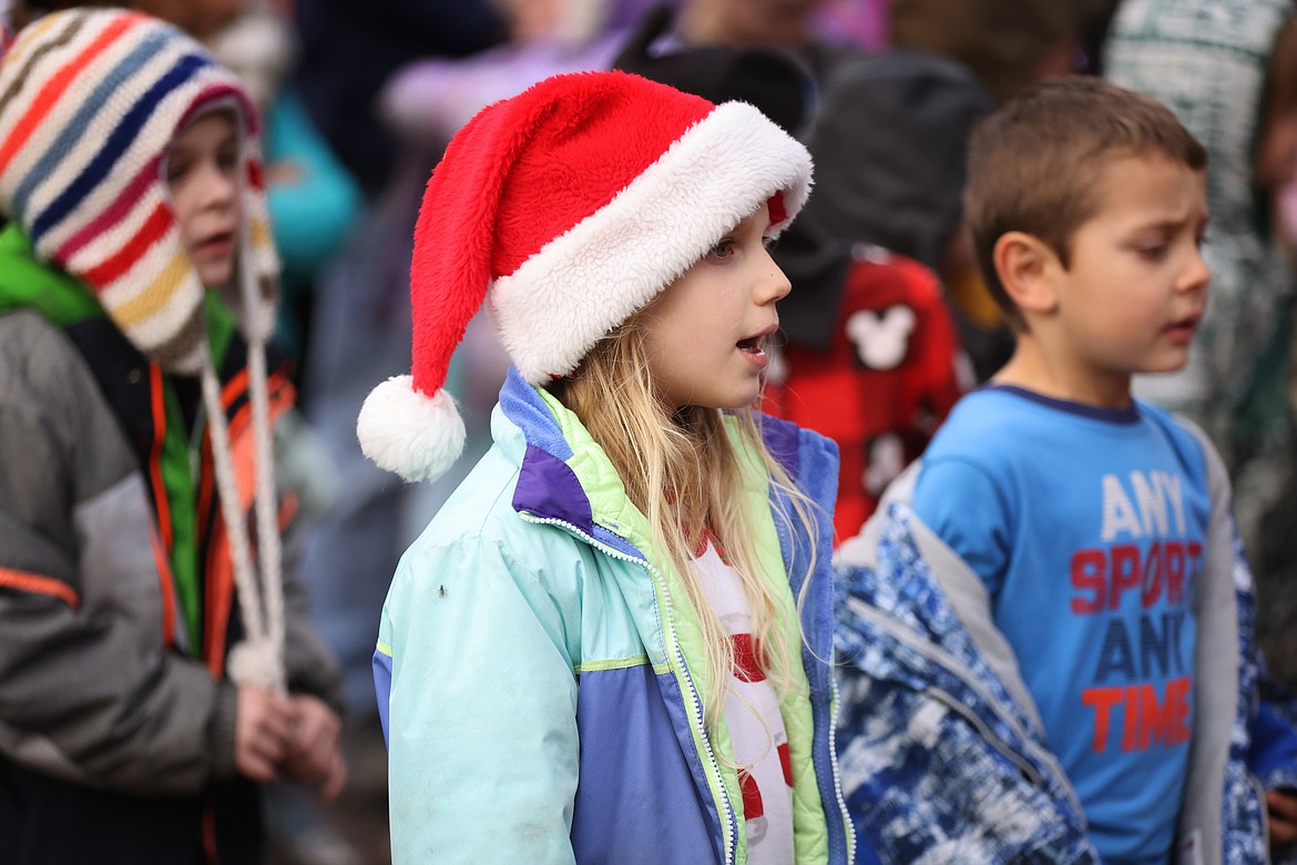 Bigfork Elementary students and teachers sing Christmas Carols at the downtown Christmas Tree Dec. 21, 2023. (Jeremy Weber/Bigfork Eagle)