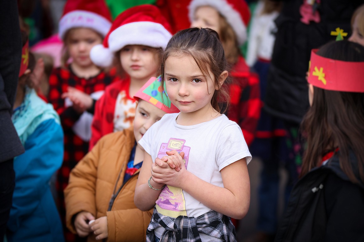 Bigfork Elementary students and teachers sing Christmas Carols at the downtown Christmas Tree Dec. 21, 2023. (Jeremy Weber/Bigfork Eagle)