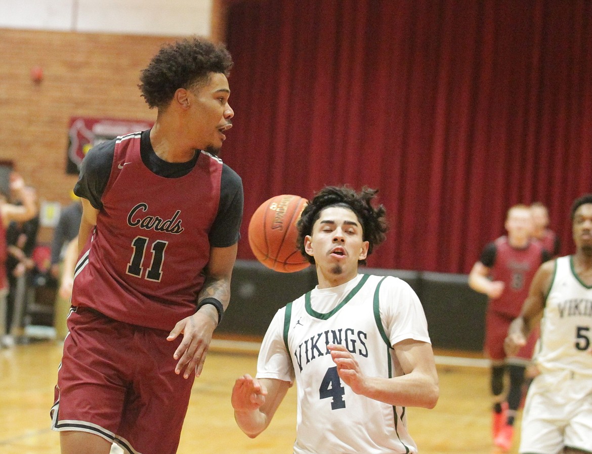 JASON ELLIOTT/Press
North Idaho College sophomore guard Dante Sawyer attempts to throw a pass behind his back during the first half of Thursday's game against Big Bend at Rolly Williams Court.