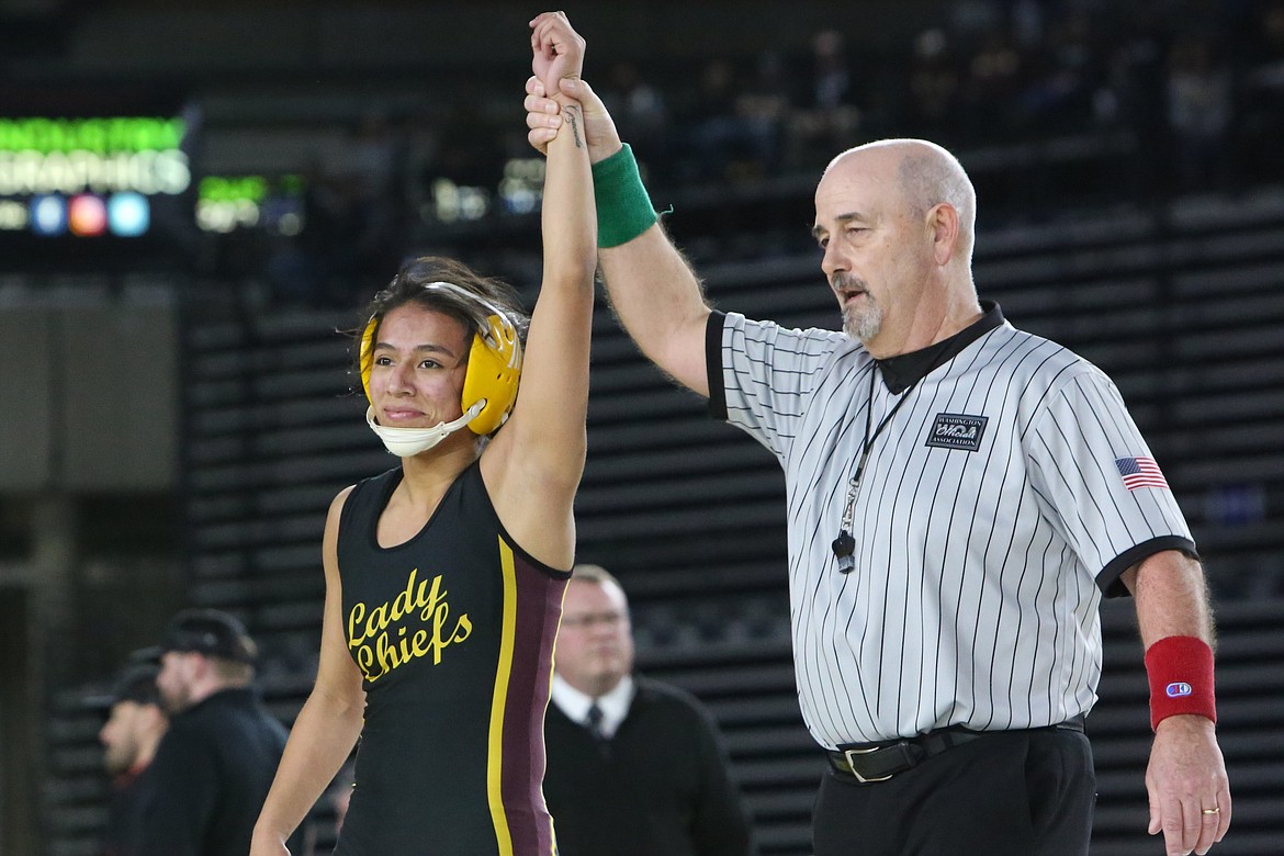 Moses Lake senior Ashley Naranjo, left, won her second-straight state championship at the Girls 3A/4A Mat Classic in Tacoma in February 2023.