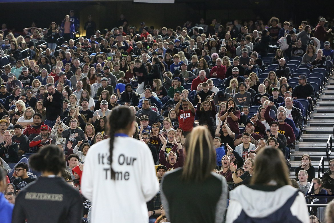 Moses Lake fans in the stands at the Tacoma Dome cheer for senior Ashley Naranjo, in white, after winning her second-straight state title.