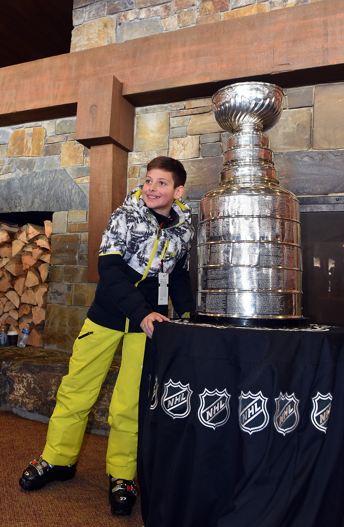 A hockey fan took a break from skiing to see the Stanley Cup up close at the base lodge of the Whitefish Mountain Resort. (Julie Engler/Whitefish Pilot)