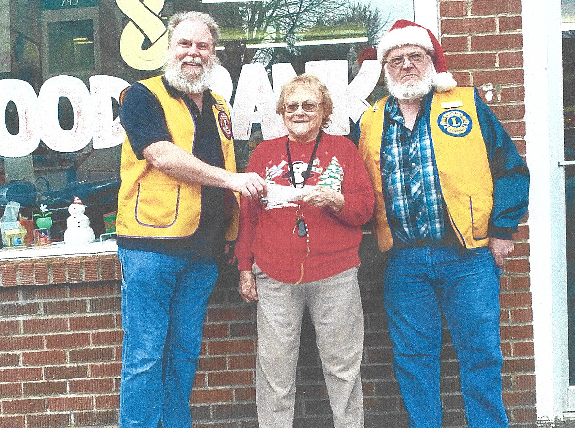 Giving to those who have a need and the Rathdrum Lions go hand in hand. The Rathdrum Lions Club has been presenting the Rathdrum food bank with a $500 check between Thanksgiving and Christmas, for more than 40 years. This year was no different as they gathered to present the check. From left: Lion's President Joseph "Hippy Joe" Hume; Sharon Dillion, manager of the Rathdrum Food Bank; and Lion member Michael "Ole" Schueller.