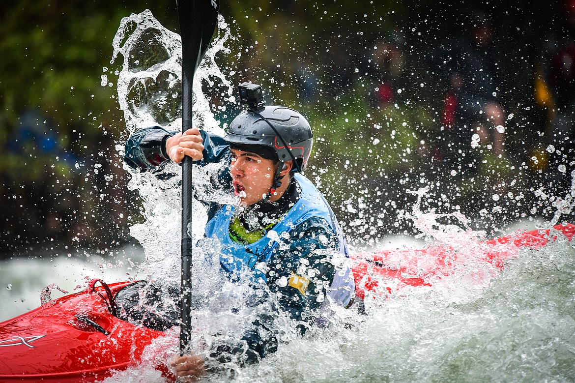 A kayaker navigates a section of the Wild Mile along the Swan River during the Expert Slalom event at the 48th annual Bigfork Whitewater Festival on Saturday, May 27. (Casey Kreider/Daily Inter Lake)